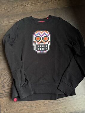 Mostly Heard Rarely Seen Black Crewneck Sweater with Multicolor Pixel Skull